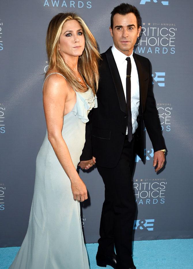 Jennifer Aniston (L) and actor/writer Justin Theroux arrive for the 21st Annual Critics