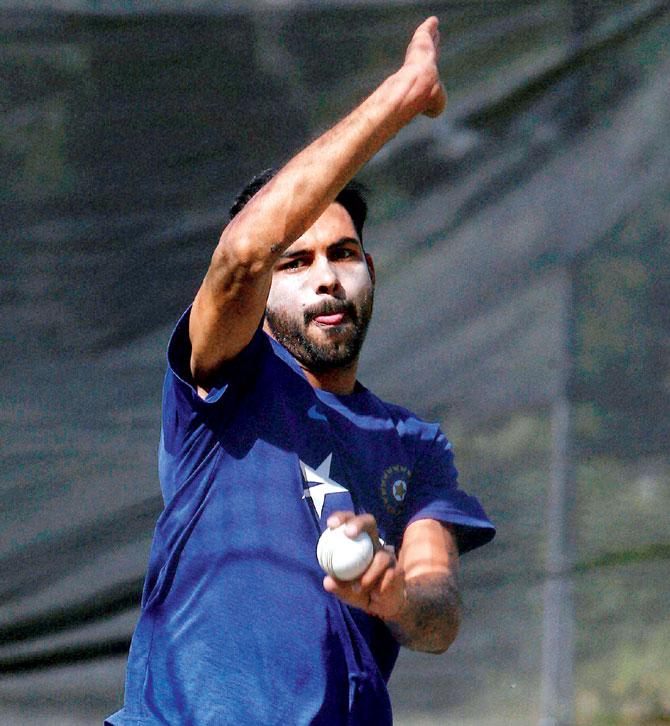Indian pace bowler Barinder Sran bowls during a practice session in Canberra yesterday. Pic:AP/PTI