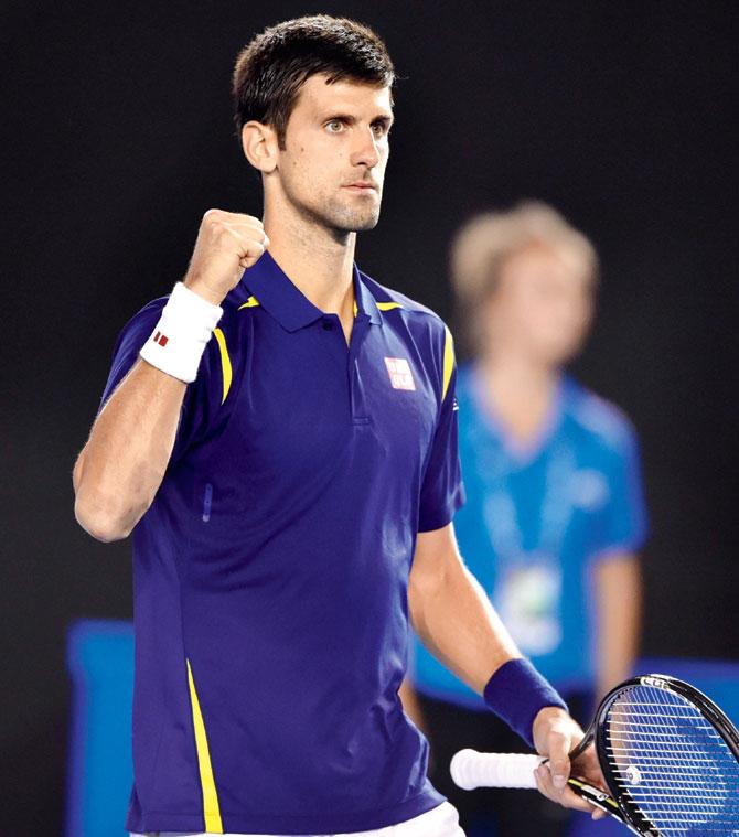 Novak Djokovic celebrates his 6-3, 6-2 win over France