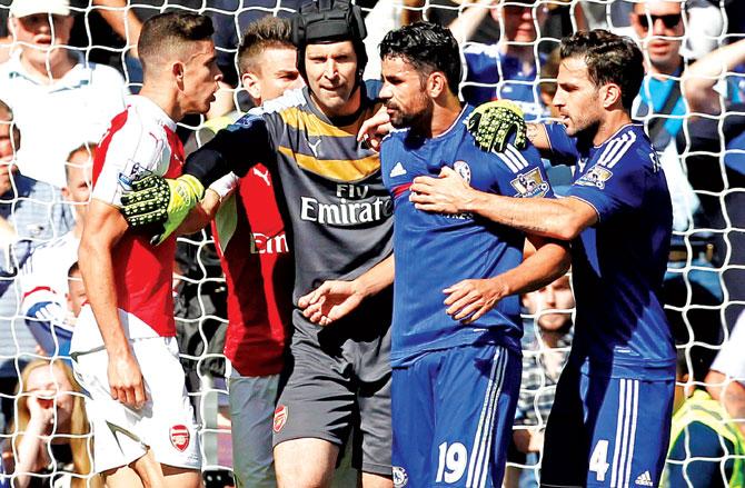 Remember the time? Arsenal defender Gabriel (left) and Chelsea striker Diego Costa (second from right) are separated by Arsenal 