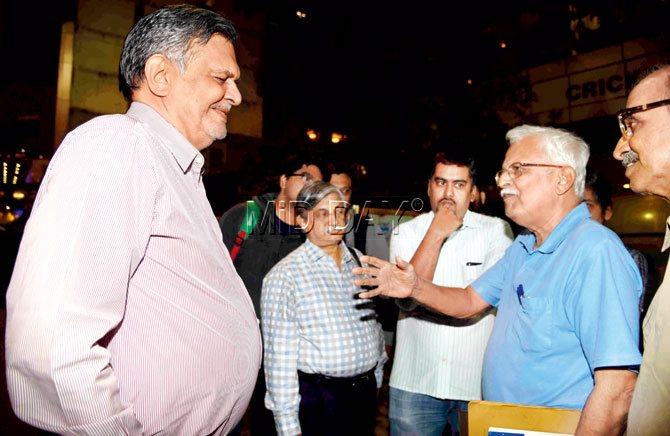Former Mumbai Cricket Association managing committee members Shripad Halbe (left) and Ravi Mandrekar chat after the MCA AGM at the Wankhede Stadium yesterday. Pic/Atul Kamble
