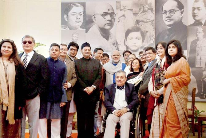 Prime Minister Narendra Modi with Netaji Subhas Chandra Bose’s family at the National Archives of India, New Delhi, where he released the digital copies of 100 declassified files related to Bose on his 119th birth anniversary. pic/PTI 