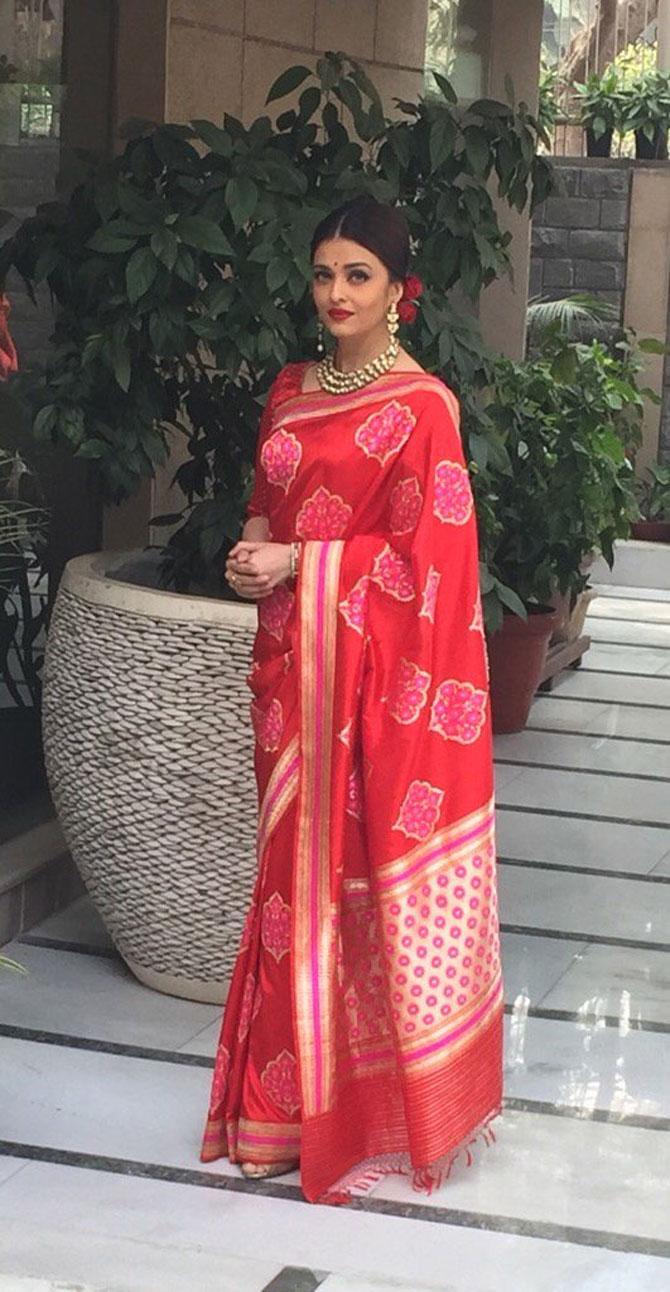 Aishwarya looks ravishing in red for lunch with French President Hollande