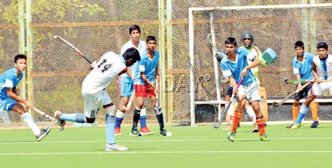 Clivert Miller (left) of Don Bosco takes a shot vs Our Lady of Dolours in the Jr Aga Khan semi-final in Kandivli. Pic/Sayyed Sameer Abedi