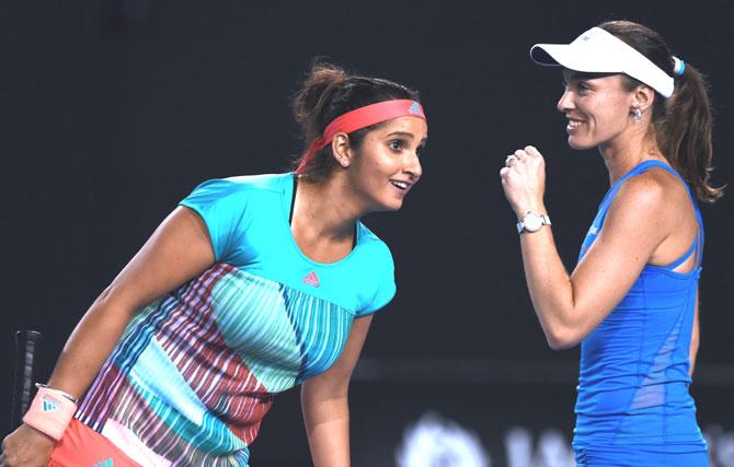 Sania Mirza and Martina Hingis. Pic/AFP