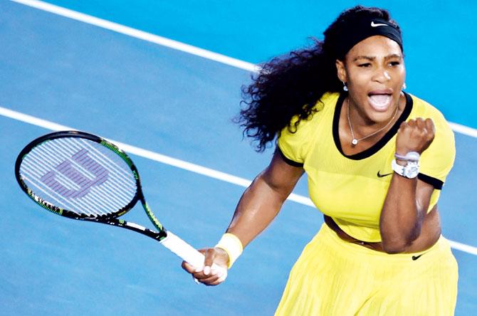 Serena Williams celebrates a point against Agnieszka Radwanska in the Australian Open semis yesterday. Pic/AFP