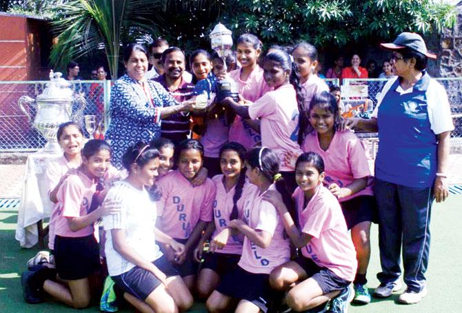 Duruelo Convent (Bandra) with the KG Kalantri girls U-16 trophy at the SAI ground in Kandivli yesterday