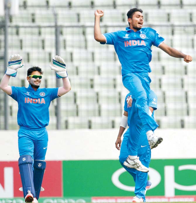 Pacer Avesh Khan (4-32) celebrates the wicket of New Zealand’s Josh Finnie at the Sher-e-Bangla National Stadium in Mirpur on Saturday. Pic/ICC