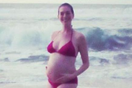 Anne Hathaway gives fans a glimpse of her baby bump