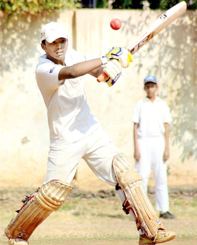 Pranav Dhanawade plays a shot en route his record-breaking 1009 not out for KC Gandhi School vs Arya Gurukul School in Kalyan yesterday. Pic/PTI