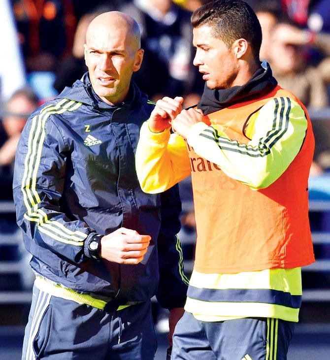 Zinedine Zidane and Cristiano Ronaldo. Pic/AFP