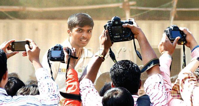 Pranav Dhanawade poses for photographers after his incredible innings of 1009 not out in a HT Bhandari Cup inter-school match for KC Gandhi against Arya Gurukul in Kalyan on Tuesday. Pic/Sameer Markande
