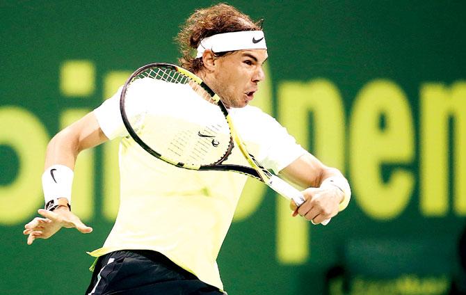 Rafael Nadal during his quarter-final match in Doha yesterday. Pic/AFP