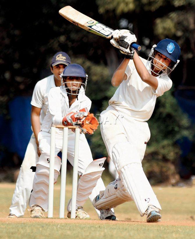 Aaradhya Shinde of IES Digambar Patkar (Dadar) plays a shot against IES VN Sule Guruji during the Harris Shield inter-school cricket tournament at Cross Madian yesterday. PIC/SHADAB KHAN 
