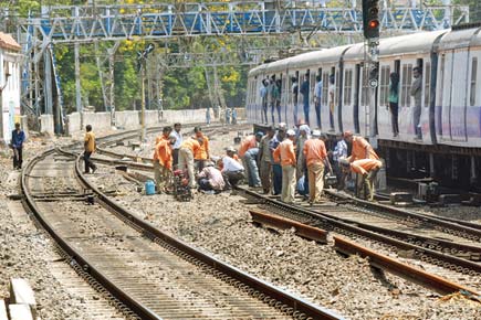 Gangmen toil to ensure Western Railway services remain on track