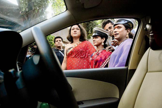 The LGBT community drivers silhouetted against the cab window at the Press Club yesterday. Pic/Bipin Kokate