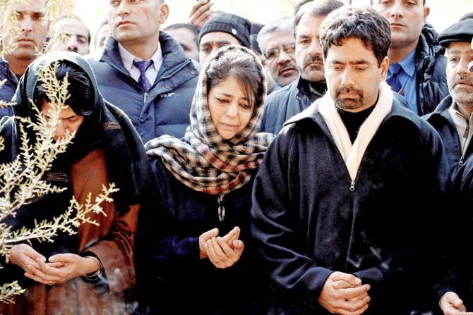 Challenges ahead: President of PDP Mehbooba Mufti with brother Mufti Tasaduq, offer special prayers for their father Mufti Mohammad Sayeed. Pic/PTI