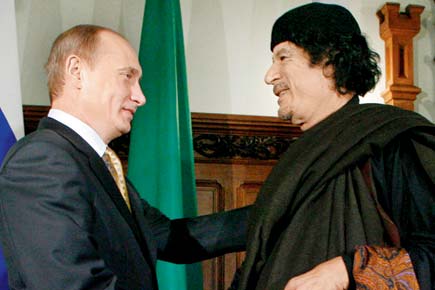 Late Libyan dictator Gaddafi tried to get heir hitched to Vladimir Putin's girl