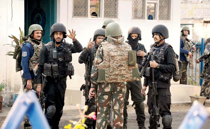 Security personnel inside the Pathankot Air Force base after the end of the military operation against militants on Tuesday. Pic/PTI