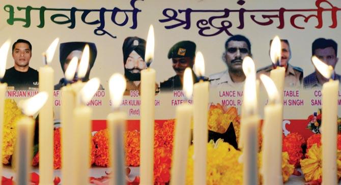 A candlelight vigil held for the Pathankot martyrs in Mumbai on Wednesday. PIC/PTI