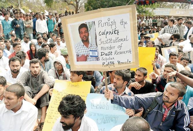For their fellow student: Students protest calling Rohith Vemula’s suicide ‘an institutional murder’, at the Hyderabad Central University yesterday. Pic/AFP