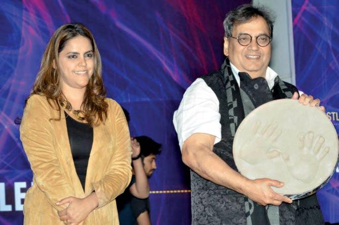 Subhash Ghai with daughter Meghna as he displays the palm print