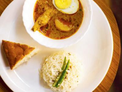Chicken Rosht with Sirmal Bread and Jeera Rice from The Bohri Kitchen menu
