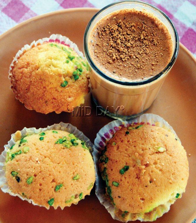  The zaffrani chai is topped with cinammon masala. The mawa cake is flavoured with pistacchio