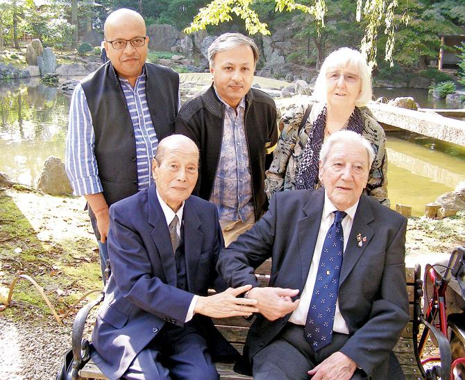 (First row from left) War veterans Isobe Kiichi and Roy Welland with (second row from right) companion Ruth Smith, Utpal Borpujari and Subimal Bhattacharjee