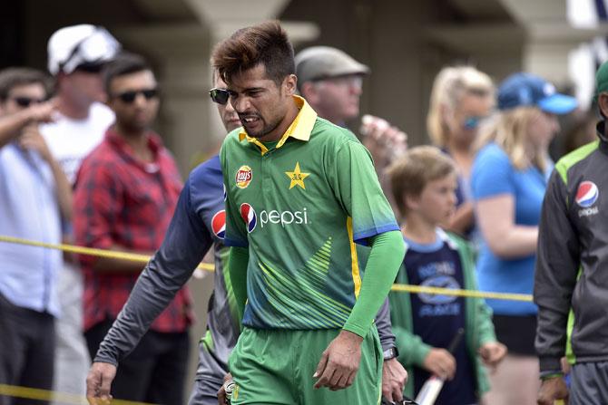Mohammad Amir of Pakistan walks from the field injured during the first one-day international between New Zealand and Pakistan