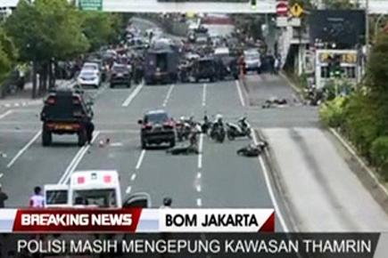 At least 4 dead in series of blasts in Jakarta, gunfight on