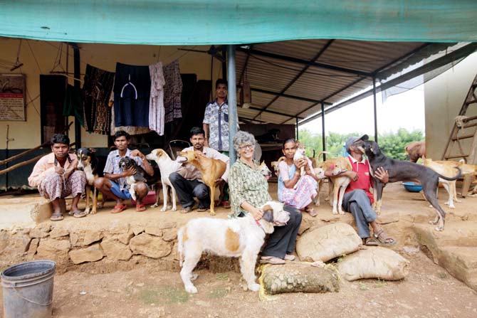 A still from the documentary shows Roxanne Davur of Probably Paradise with her animals and residents from the nearby Takwe village
