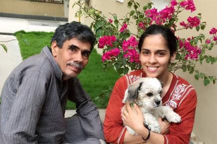 Saina Nehwal shares adorable picture with her dad and dog