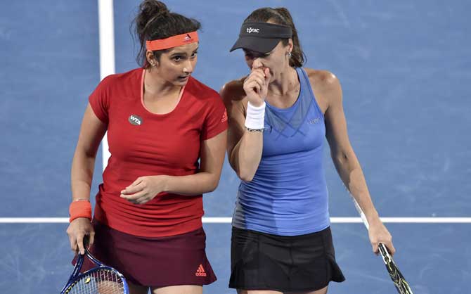 Sania Mirza and Martina Hingis.Pic/AFP