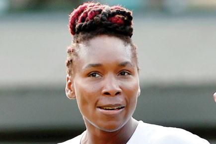 Venus Williams stretched in third round
