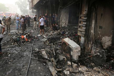 Photos: 130 people killed in suicide car bomb attacks in Baghdad