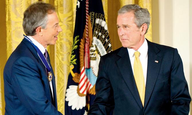 Former US President George W Bush (right) said there was no stronger ally than Britain under Tony Blair’s leadership. File Pic/AFP