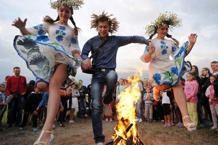Wow! People jump over the bonfire at this festival in Ukraine
