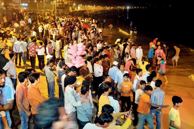 Mumbaikars celebrate at Juhu Beach as they bring in the new year — one of  the rare occasions when the beach is open late night. File pic for representation