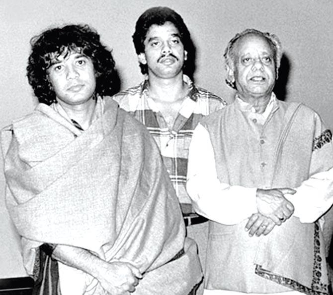 Abbaji (right) with his sons Zakir Hussain (extreme left) and Fazal Qureshi (centre)