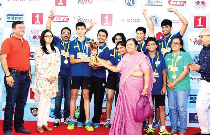 Supreme Fighters with their Mumbai Super League table tennis winners trophy at the NSCI Stadium in Worli recently 