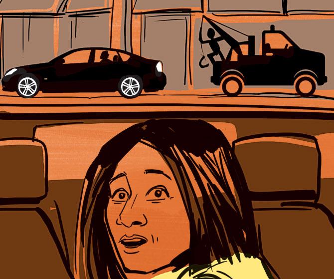 Sitting in the backseat, she suddenly notices a towing van approaching. Fearing her Mercedes car could be towed away, she starts to climb from the backseat to the driver