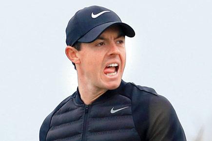 Golf: Rory McIlroy hurls club in frustration