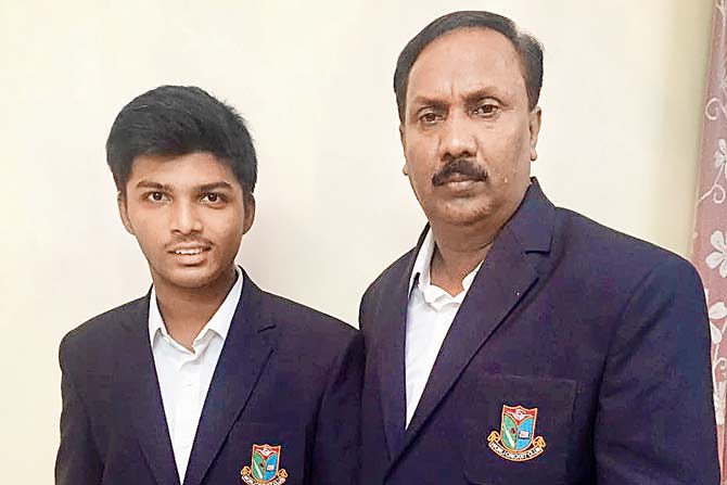 Pranav Dhanawade (left) with coach Mobin Shaikh in their Worli Cricket Club blazers