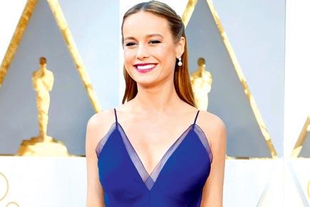 Brie Larson apologises to fans for sharing photo of herself with dolphin 