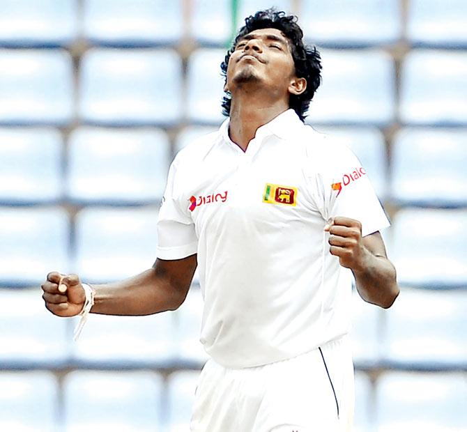 SL debutant spinner Lakshan Sandakan is ecstatic after claiming four wickets vs Aus in Pallekele. Pics/AFP