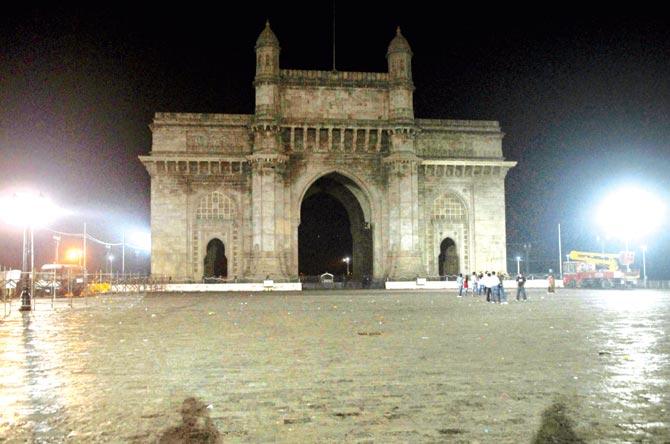 The Gateway of India at midnight, when photographers who will snap your pictures for 50 bucks have all returned to the far-flung suburbs. File pic 