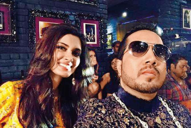 make some noise: Mika Singh snaps a selfie with Diana Penty during the shoot of Gabru Ready To Mingle Hai, a promo song for the film, Happy Bhag Jayegi