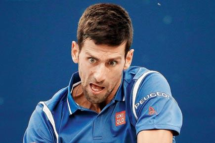 Lucky Novak Djokovic seals semis spot