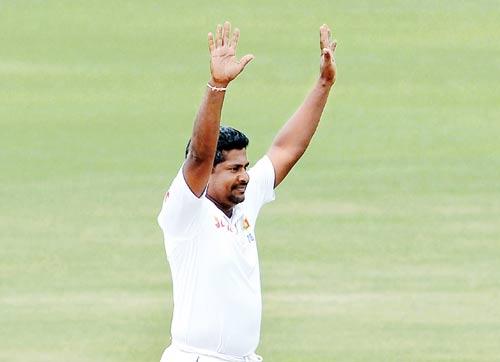 Rangana Herath celebrates Sri Lanka’s win after dismissing Australia’s Steve O’Keeffe at Pallekele on Saturday. PIC/AFP